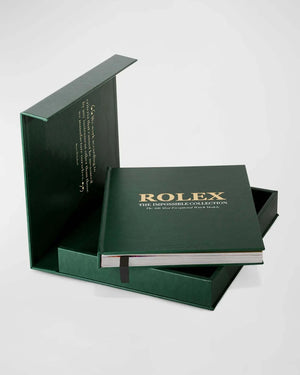 Luxury Assouline "Rolex: The Impossible Collection" book by Fabienne Reybaud in green leather case.