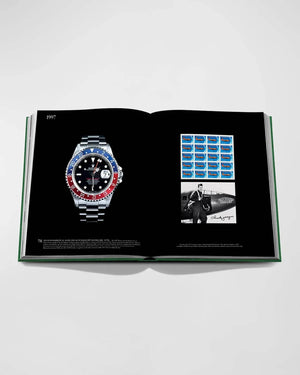 Luxury Rolex watch book open to a page with detailed images and descriptions.