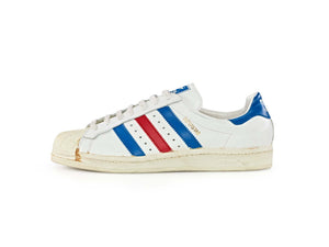 ADIDAS ARCHIVE: THE FOOTWEAR COLLECTION book showcasing vintage adidas sneaker.